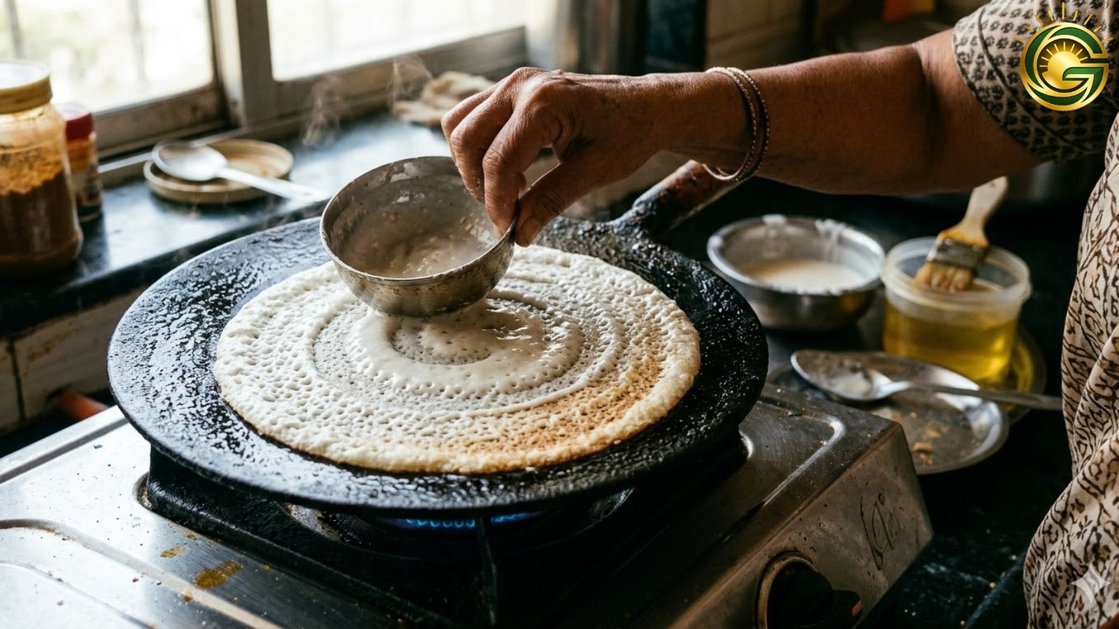 Spreading the perfect batter for Crispy Masala Dosa Recipe.