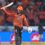 Abhishek Sharma celebrating century and SRH climbing IPL 2026 points table.